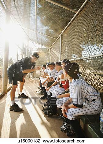 USA, California, Ladera Ranch, Boys (10-11) from little league sitting on dugout while coach talking View Large Photo Image Stock Image - USA, California, Ladera Ranch, Boys (10-11) from little league sitting on dugout while coach talking. Fotosearch