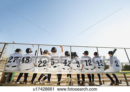 USA, California, Ladera Ranch, Boys (10-11) from little league sitting on bench, rear view View Large Photo Image Stock Image - USA, California, Ladera Ranch, Boys (10-11) from little league sitting on bench, rear view. Fotosearch