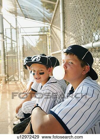 USA, California, Ladera Ranch, boys (10-11)from little league baseball team on dugout View Large Photo Image Stock Photo - USA, California, Ladera Ranch, boys (10-11)from little league baseball team on dugout. Fotosearch