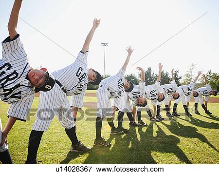 Stock Photo - USA, California, Ladera Ranch, Boys (10-11) from little league training. Fotosearch