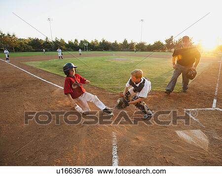 USA, California, Ladera Ranch, boys (10-11) playing baseball View Large Photo Image Stock Photo - USA, California, Ladera Ranch, boys (10-11) playing baseball. Fotosearch