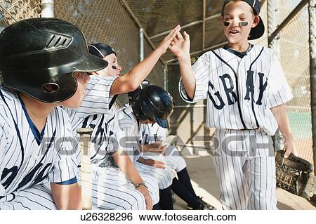 USA, California, Ladera Ranch, Boys (10-11) from little league sitting on dugout View Large Photo Image Stock Photograph - USA, California, Ladera Ranch, Boys (10-11) from little league sitting on dugout. Fotosearch