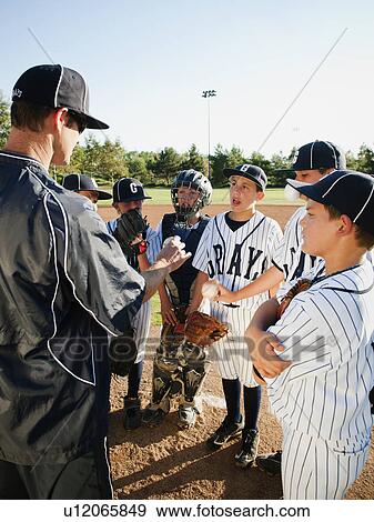 USA, California, Ladera Ranch, coach training little league baseball team (10-11) View Large Photo Image Stock Photo - USA, California, Ladera Ranch, coach training little league baseball team (10-11). Fotosearch
