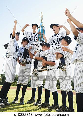 USA, California, Ladera Ranch, little league players (aged 10-11) celebrating View Large Photo Image Stock Photo - USA, California, Ladera Ranch, little league players (aged 10-11) celebrating. Fotosearch