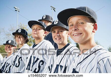 USA, California, Ladera Ranch, portrait of little league players (aged 10-11) View Large Photo Image Stock Photo - USA, California, Ladera Ranch, portrait of little league players (aged 10-11). Fotosearch