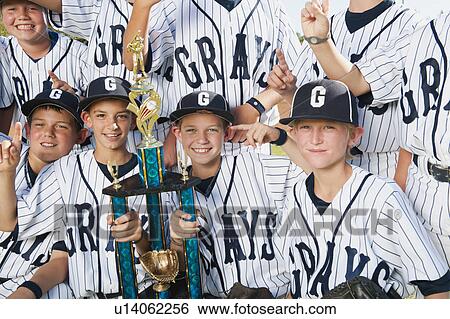 Stock Photograph - USA, California, Ladera Ranch, portrait of little league players (aged 10-11). Fotosearch