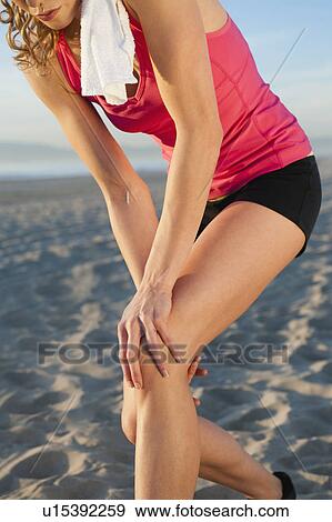 USA, California, Los Angeles, woman exercising on beach View Large Photo Image Stock Photo - USA, California, Los Angeles, woman exercising on beach. Fotosearch