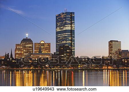 Stock Image - USA, Massachusetts, Boston skyline at dusk. Fotosearch