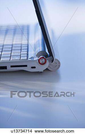 Picture - USA, New Jersey, Jersey City, Close-up view of open laptop. Fotosearch