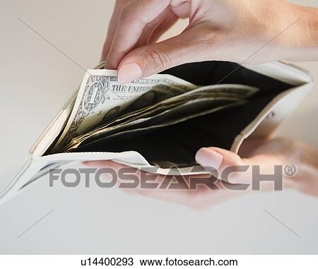 USA, New Jersey, Jersey City, Close-up view of pulling one dollar note from wallet View Large Photo Image Stock Image - USA, New Jersey, Jersey City, Close-up view of pulling one dollar note from wallet. Fotosearch