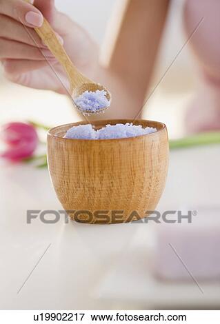 USA, New Jersey, Jersey City, Close-up view of woman hand holding spoon with salt View Large Photo Image Stock Photo - USA, New Jersey, Jersey City, Close-up view of woman hand holding spoon with salt. Fotosearch