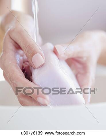 USA, New Jersey, Jersey City, Close-up view of woman washing hands View Large Photo Image Stock Photo - USA, New Jersey, Jersey City, Close-up view of woman washing hands. Fotosearch