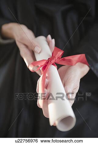 USA, New Jersey, Jersey City, Close-up view of woman hands holding diploma View Large Photo Image Stock Photograph - USA, New Jersey, Jersey City, Close-up view of woman hands holding diploma. Fotosearch