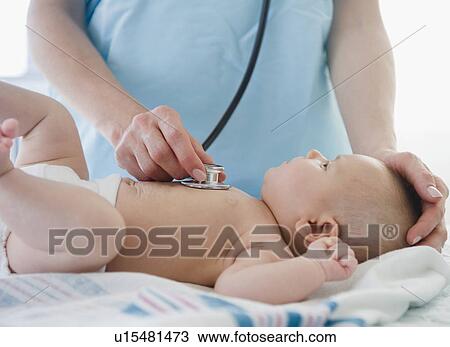 USA, New Jersey, Jersey City, Female doctor examining baby girl (2-5 months) View Large Photo Image Stock Image - USA, New Jersey, Jersey City, Female doctor examining baby girl (2-5 months). Fotosearch