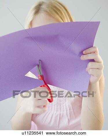 USA, New Jersey, Jersey City, Girl (8-9) cutting star shape in paper View Large Photo Image Stock Image - USA, New Jersey, Jersey City, Girl (8-9) cutting star shape in paper. Fotosearch