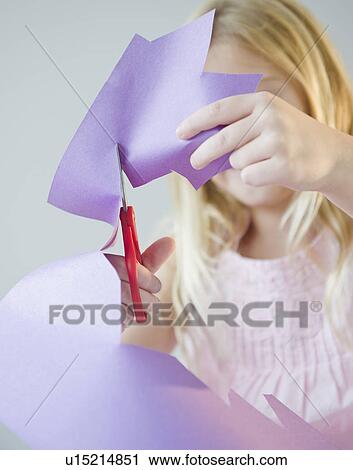 USA, New Jersey, Jersey City, Girl (8-9) cutting star shape in paper View Large Photo Image Stock Image - USA, New Jersey, Jersey City, Girl (8-9) cutting star shape in paper. Fotosearch