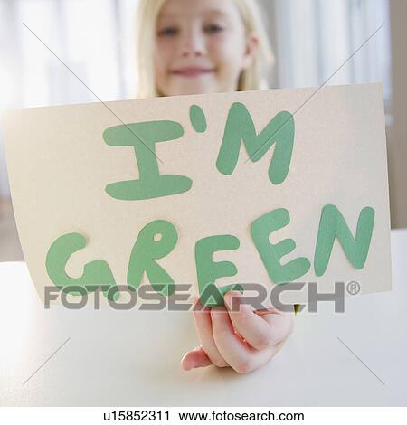 USA, New Jersey, Jersey City, Girl (8-9) holding "I'm green" board View Large Photo Image Stock Image - USA, New Jersey, Jersey City, Girl (8-9) holding "I'm green" board. Fotosearch