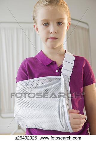 USA, New Jersey, Jersey City, Girl (8-9) with hand in cast View Large Photo Image Stock Photography - USA, New Jersey, Jersey City, Girl (8-9) with hand in cast. Fotosearch