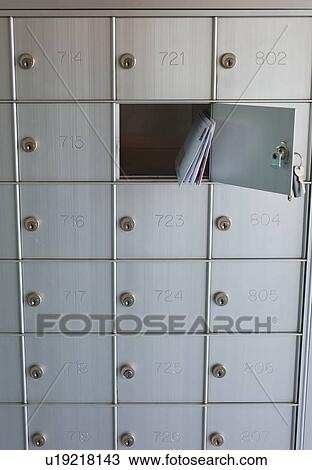 Stock Image - USA, New Jersey, Jersey City, Letters in mailbox. Fotosearch