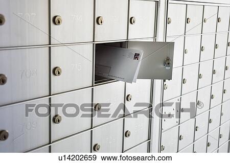 Stock Photo - USA, New Jersey, Jersey City, Letters in mailbox. Fotosearch
