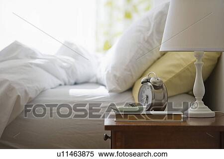 Stock Photography - USA, New Jersey, Jersey City, Morning in bedroom. Fotosearch