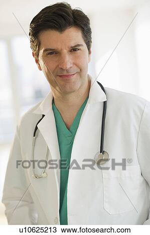 Stock Image - USA, New Jersey, Jersey City, Portrait of male doctor with stethoscope. Fotosearch