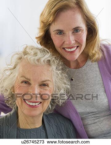 USA, New Jersey, Jersey City, Portrait of mother and daughter smiling View Large Photo Image Stock Image - USA, New Jersey, Jersey City, Portrait of mother and daughter smiling. Fotosearch