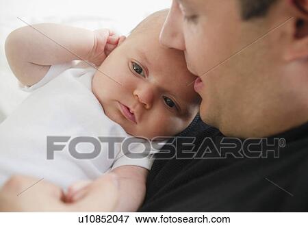 USA, New Jersey, Jersey City, Portrait of father and baby daughter (2-5 months) View Large Photo Image Stock Photo - USA, New Jersey, Jersey City, Portrait of father and baby daughter (2-5 months). Fotosearch
