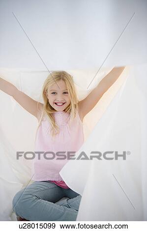 USA, New Jersey, Jersey City, Portrait of enthusiastic young girl (8-9) View Large Photo Image Stock Photo - USA, New Jersey, Jersey City, Portrait of enthusiastic young girl (8-9). Fotosearch