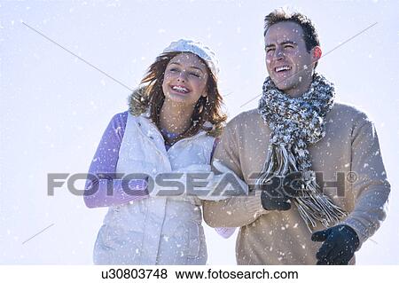 Stock Photo - USA, New Jersey, Jersey City, Portrait of young couple. Fotosearch