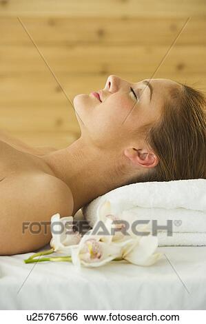 USA, New Jersey, Jersey City, Portrait of young woman in spa View Large Photo Image Stock Photograph - USA, New Jersey, Jersey City, Portrait of young woman in spa. Fotosearch