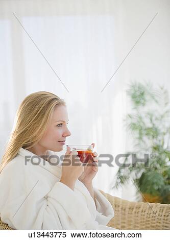 USA, New Jersey, Jersey City, Attractive young woman enjoying cup of tea View Large Photo Image Stock Photography - USA, New Jersey, Jersey City, Attractive young woman enjoying cup of tea. Fotosearch