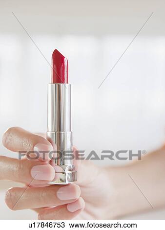 USA, New Jersey, Jersey City, Woman's hand holding lipstick View Large Photo Image Stock Image - USA, New Jersey, Jersey City, Woman's hand holding lipstick. Fotosearch