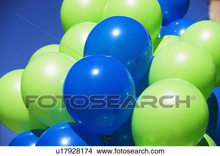 Picture - USA, New York, Albany, green and blue balloons. Fotosearch