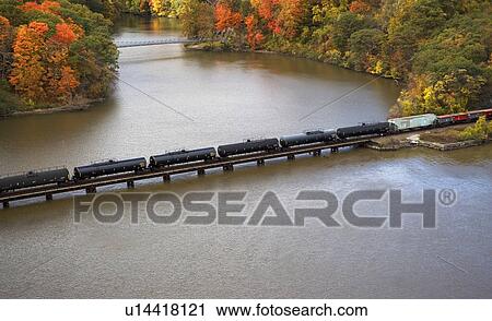 USA, New York, Bear Mountain, aerial view of train crossing lake View Large Photo Image Stock Image - USA, New York, Bear Mountain, aerial view of train crossing lake. Fotosearch