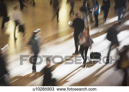 Stock Image - USA, New York City, commuters in motion. Fotosearch