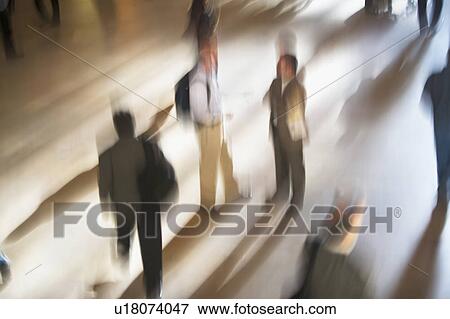 Stock Photo - USA, New York City, commuters in motion. Fotosearch