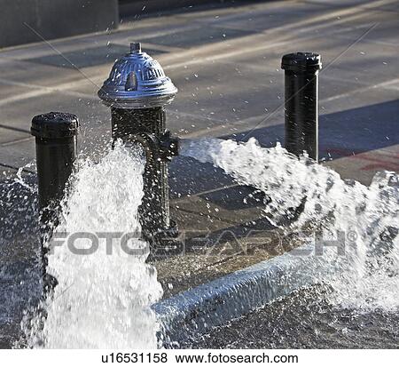 USA, New York City, hydrant pouring out water View Large Photo Image Stock Photo - USA, New York City, hydrant pouring out water. Fotosearch
