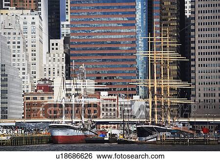 Stock Photograph - USA, New York City, Manhattan, ships in harbor. Fotosearch