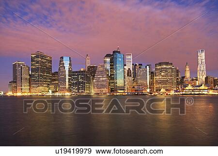 USA, New York City, Manhattan skyline at dusk View Large Photo Image Stock Photo - USA, New York City, Manhattan skyline at dusk. Fotosearch