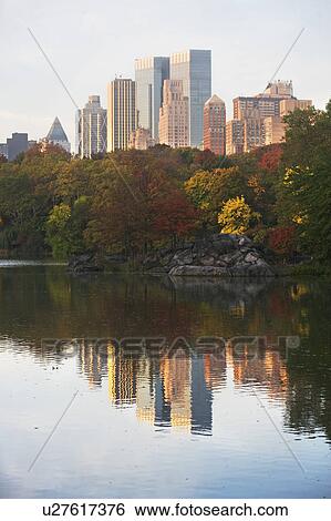 Stock Photograph - USA, New York City, Manhattan skyline from Central Park. Fotosearch