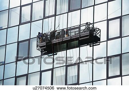 USA, New York City, Manhattan, window cleaning platform on building View Large Photo Image Stock Photograph - USA, New York City, Manhattan, window cleaning platform on building. Fotosearch