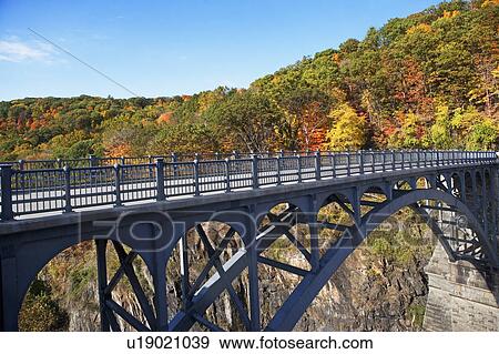 Stock Photo - USA, New York, Croton, footbridge. Fotosearch