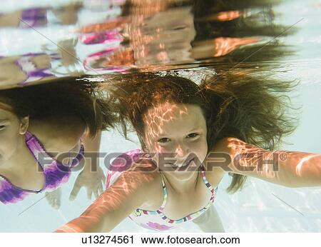 USA, New York, Girls (10-11, 10-11) in swimming pool View Large Photo Image Stock Image - USA, New York, Girls (10-11, 10-11) in swimming pool. Fotosearch