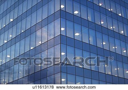 USA, New York, Long Island City, glass facade of office building View Large Photo Image Stock Photo - USA, New York, Long Island City, glass facade of office building. Fotosearch