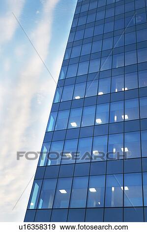 Stock Photo - USA, New York, Long Island City, glass facade of office building. Fotosearch