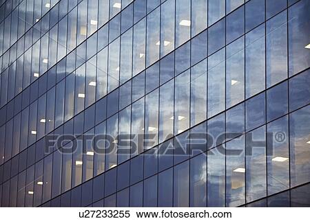USA, New York, Long Island City, glass facade of office building View Large Photo Image Stock Photography - USA, New York, Long Island City, glass facade of office building. Fotosearch