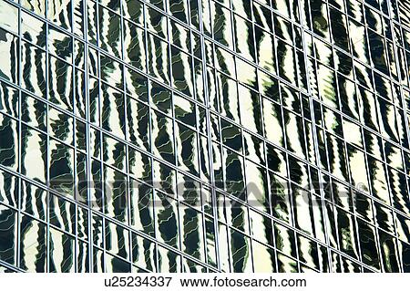 USA, New York, New York City, Reflections in windows of office block View Large Photo Image Stock Photo - USA, New York, New York City, Reflections in windows of office block. Fotosearch