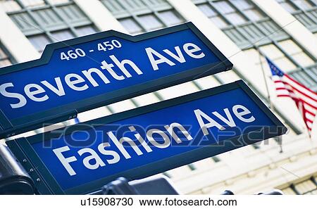 Stock Image - USA, New York, New York City, Street sign for Fashion Avenue and Seventh Avenue in Manhattan. Fotosearch