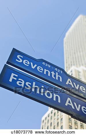 Stock Photo - USA, New York, New York City, Street sign for Fashion Avenue and Seventh Avenue in Manhattan. Fotosearch